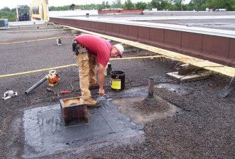 Patching and repairing tar and gravel roofs
